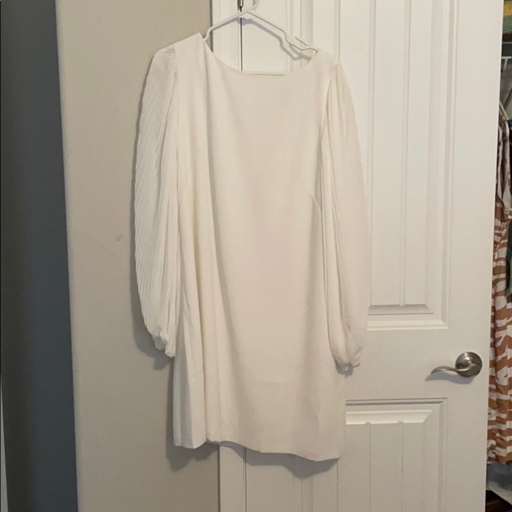 White flounce sleeve dress